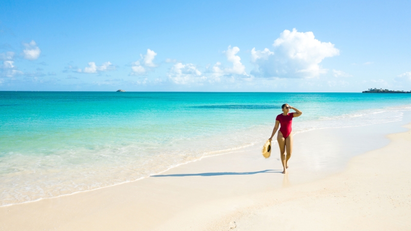 Lady walking on the beach