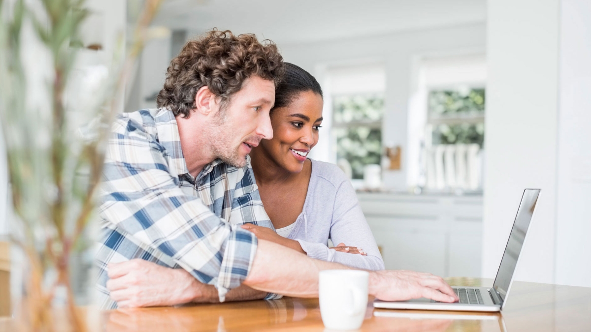 Couple looking at a computer