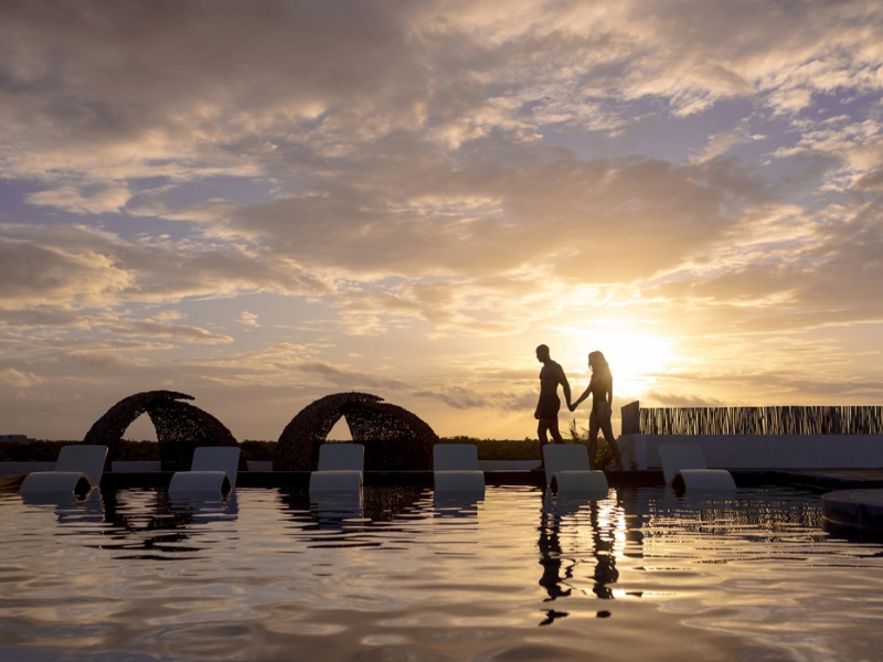Couple Sunset Pool