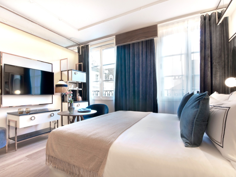 Singular Room with Glimpses of Notre Dame