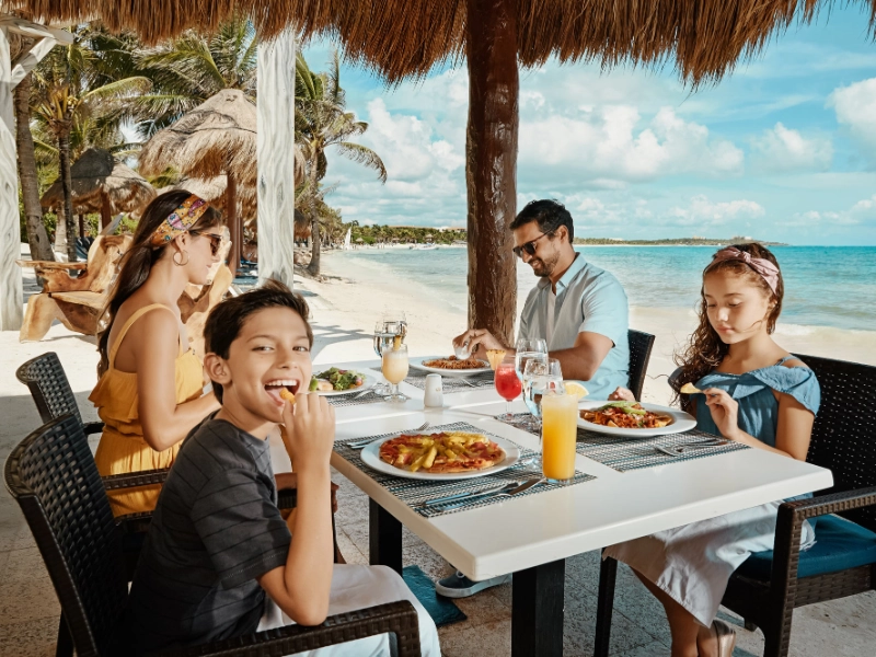 Family eating at Grand Palladium White Sand Resort   Spa