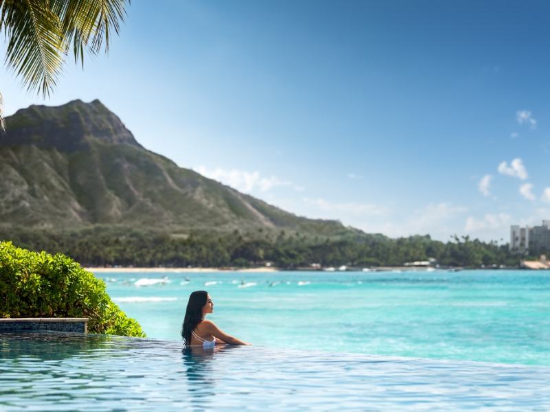 Girl Looking Out from Infinity Pool